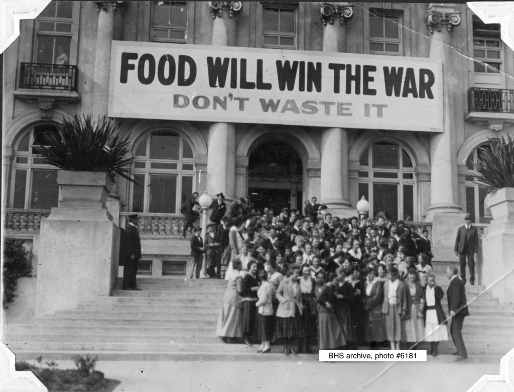 Picture featuring a banner reading "Food will Win the War."