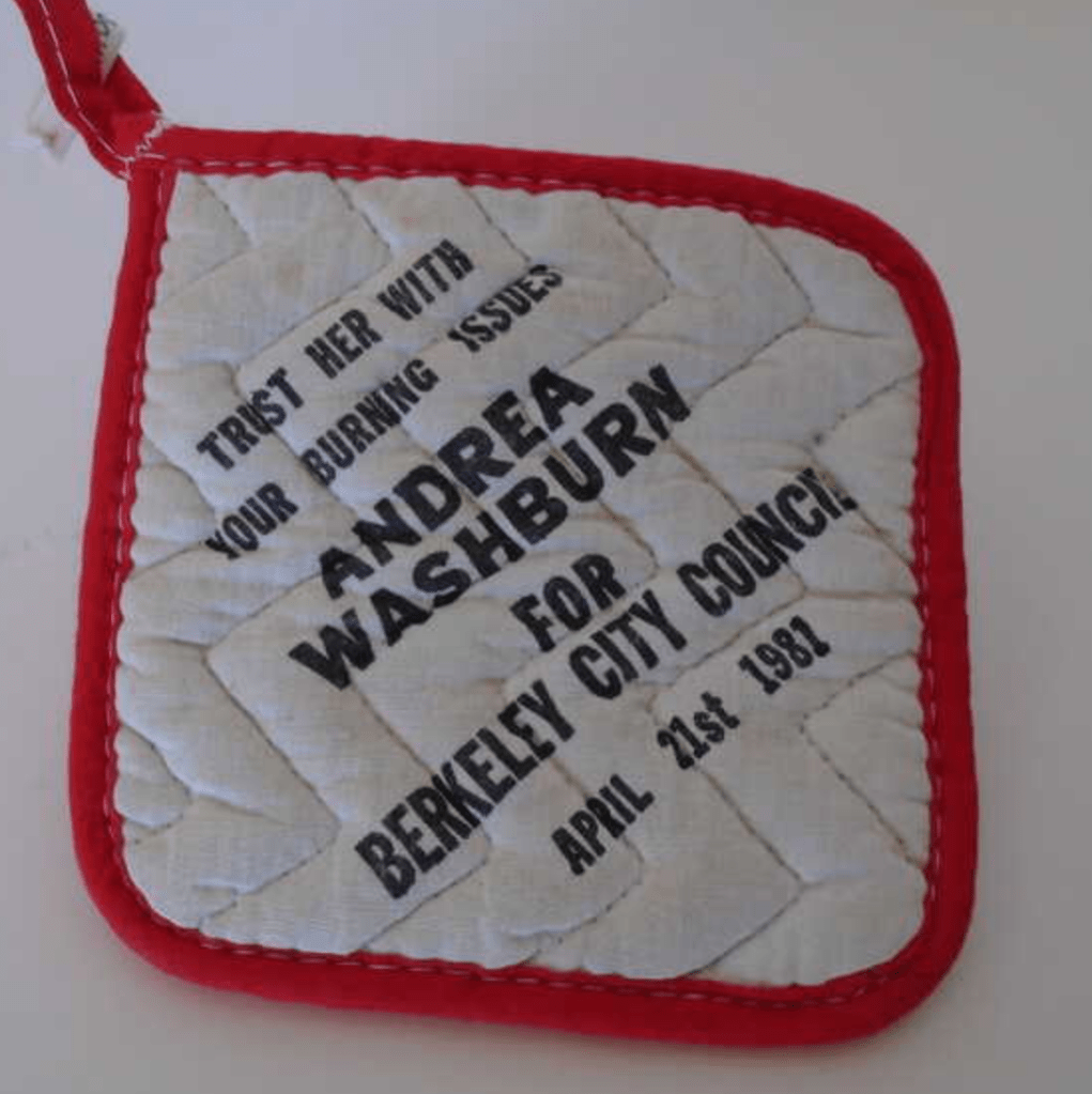 Picture of a hot pad that says "Trust her with your burning issues" - Andrea Washburn for Berkeley City Council 1981